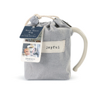 Demdaco Joyful Heart Mug in cream stoneware with a heart design in fabric pouch, available at Be Charmed.