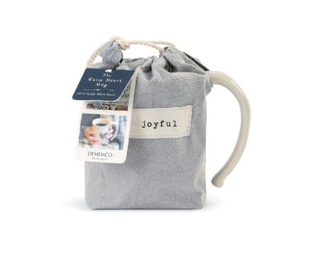 Demdaco Joyful Heart Mug in cream stoneware with a heart design in fabric pouch, available at Be Charmed.