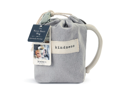 Demdaco “Kind” Heart Mug in pouch, 16 oz stoneware with heart cutout and “Kind” sentiment in warm ceramic—microwave & dishwasher safe—available at Be Charmed.