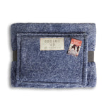 Blue lap blanket with 'cozied up' label on a white background. Available at Be Charmed