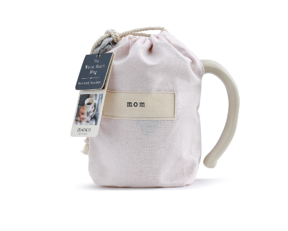 Demdaco Mom Heart Mug in cream stoneware with a heart design in pink fabric pouch, available at Be Charmed.