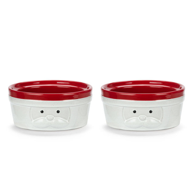 Pair of Demdaco Santa Ramekins (4.5″ dia x 2″ h), 8 oz stoneware with Santa face and red rim—available at Be Charmed.