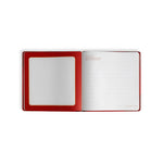 Opend Journal ofDemdaco Santa’s Kindness Journal with festive red cover and guided pages encouraging daily acts of kindness during the holidays. A heartfelt tradition. Available at Be Charmed