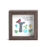 Decorative wall art with a frame, plants, and text on a white background. Available at Be Charmed
