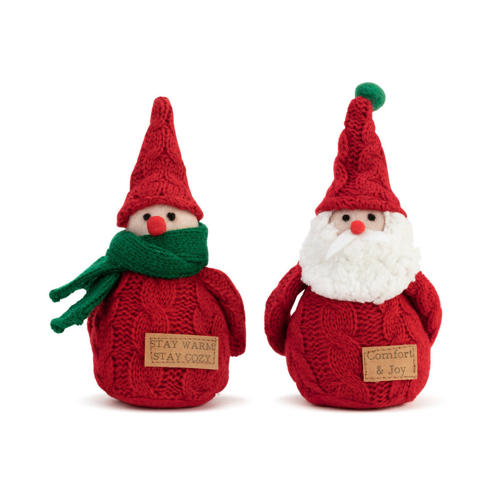 Demdaco small red gnome figures (3″ W × 6.5″ H), Scandinavian-inspired plush and sandstone materials—available at Be Charmed.