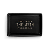 Black tray with 'The Man, The Myth, The Legend' text on a white background. Available at Be Charmed