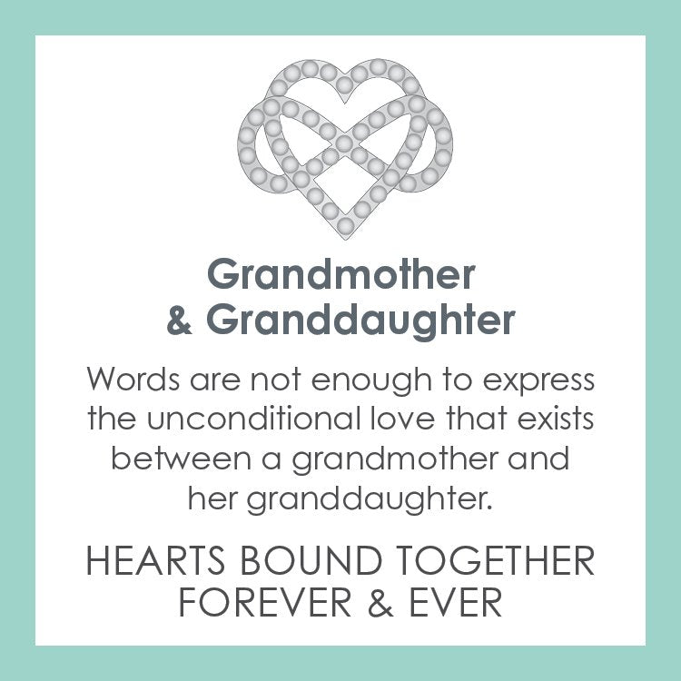 Description card for Lola grandmother and granddaughter silver pendant symbolizing love, family, and connection by Be Charmed. Available at Be Charmed
