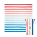 Dock & Bay Picnic Blanket – Vibrant, eco-friendly blanket with waterproof backing, ideal for picnics and beach days, available in Sand to Sea at Be Charmed.