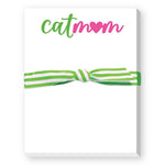 A white notepad with a green and pink 'Cat Mom' text and a decorative green ribbon bow. Available at Be Charmed