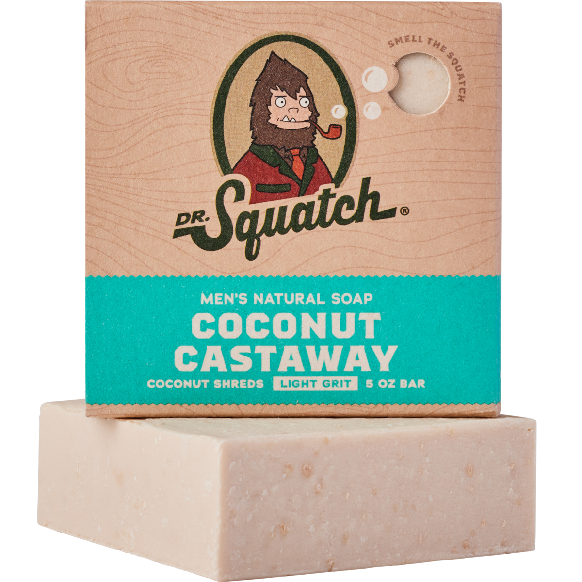 Dr. Squatch Coconut Castaway bar soap with coconut shreds, milk & toasted coconut scent. Light‑grit exfoliation. Available at Be Charmed.