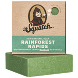 Dr. Squatch Rainforest Rapids bar soap with eucalyptus, pumice exfoliation & crisp jungle scent. Light‑grit natural formula. Available at Be Charmed.