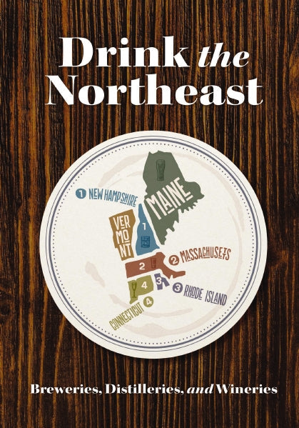 Book cover of 'Drink the Northeast' featuring a circular graphic with text and state names, indicating a guide to wineries, breweries, and distilleries in the Northeast region of the USA. Available at Be Charmed