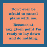 Text on an orange coaster with a blue border. Available at Be Charmed