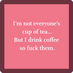 Drinks on Me "Cup of Tea" A square-shaped pink coaster with white text that reads: 'I'm not everyone's cup of tea... But I drink coffee so fuck them.' Available at Be Charmed