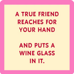 Stylish and funny Drinks On Me coaster with “Put A Wine Glass” design. Durable and perfect for protecting surfaces in home bars or wine lovers’ spaces. Available at Be Charmed.
