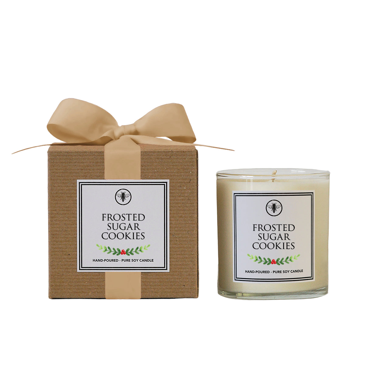 Frosted Sugar Cookies candle with packaging on a light gray background. Available at Be Charmed. 
