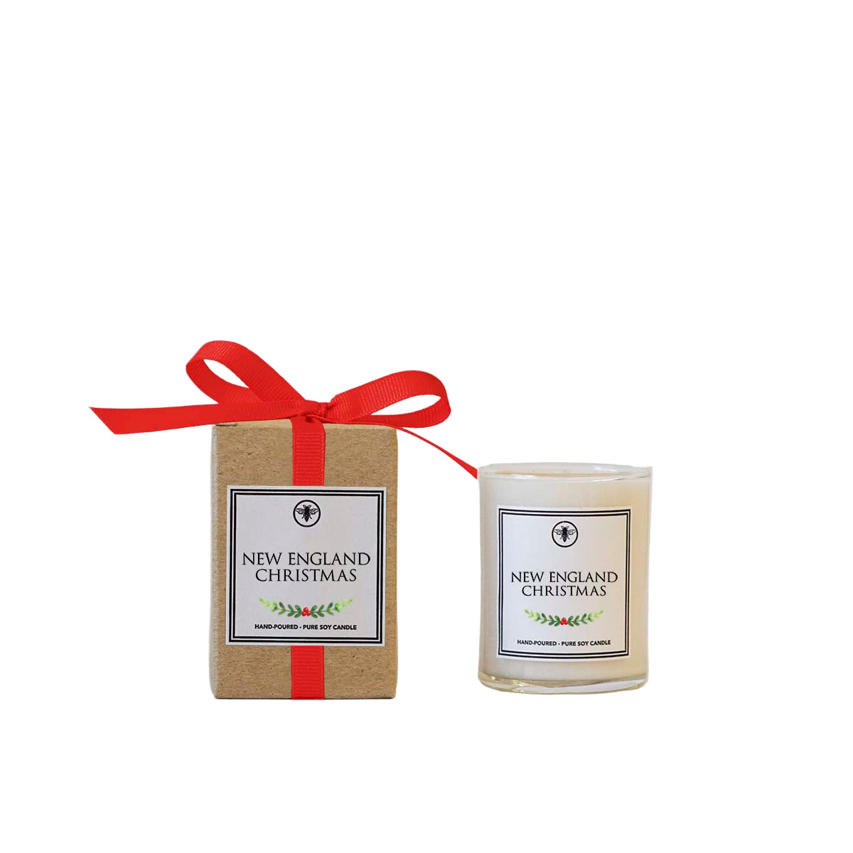 New England Christmas candle and packaging with a red ribbon on a white background. Available at Be Charmed. 