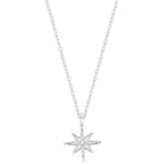 Silver star-shaped pendant on a chain against a white background. Available at Be Charmed