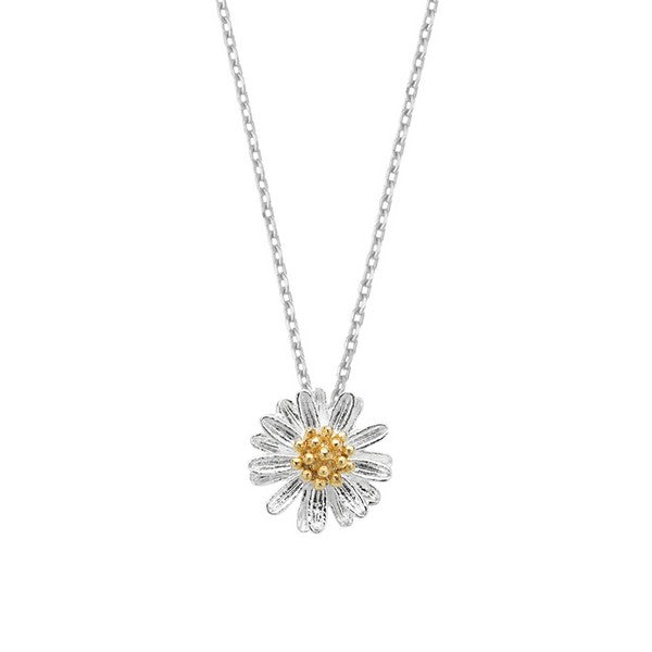 Floral pendant necklace with gold center on a white background. Available at Be Charmed