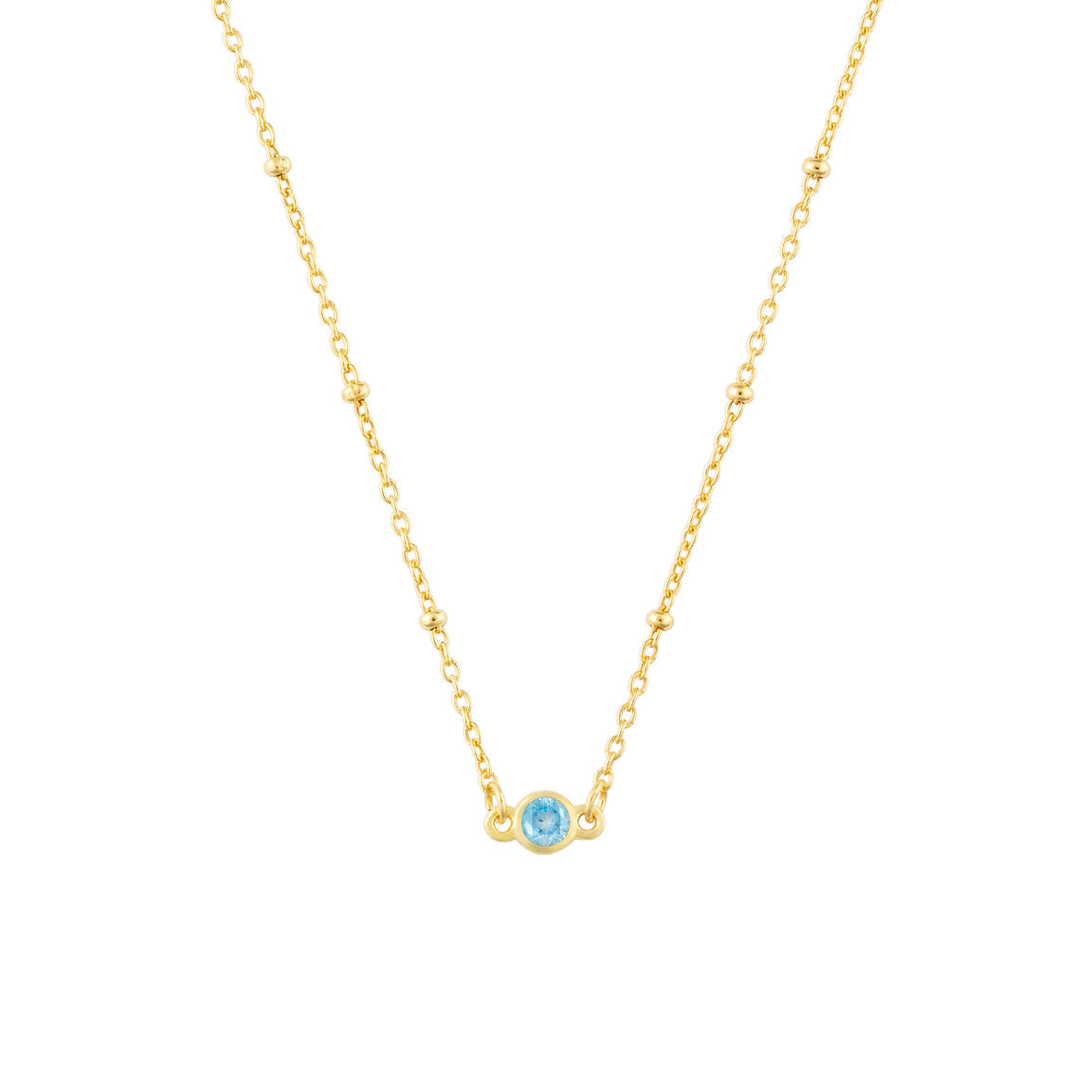 March FYB Gold Birthstone Necklace featuring a dainty bezel-set stone on a delicate gold chain. Available at Be Charmed