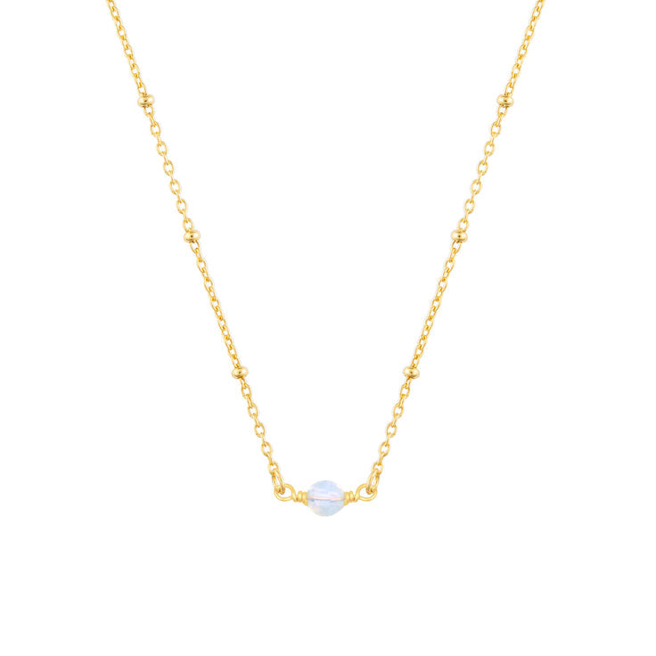 October FYB Gold Birthstone Necklace featuring a dainty bezel-set stone on a delicate gold chain. Available at Be Charmed.