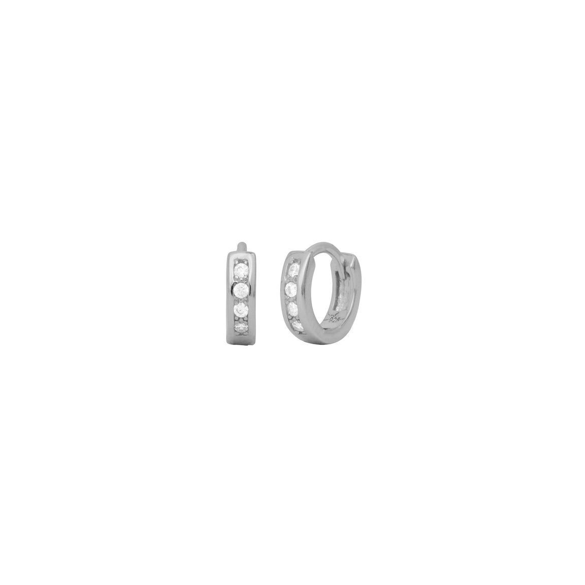 Silver fyb Daphne Huggie Earrings in sterling silver with pave-set cubic zirconia for a subtle sparkle. Petite, elegant hoops for everyday wear. Available at Be Charmed.