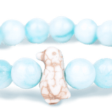 Seafoam Fahlo The Penguin Passage Bracelet with penguin charm and adjustable band. Meaningful jewelry gift. Available at Be Charmed