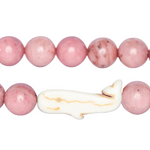 Fahlo pink sands beaded bracelet with a white and gold charm on a white background. Available at Be Charmed
