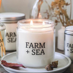 Farm + Sea 14 oz White Pumpkin Candle. Creamy pumpkin, vanilla, and fall spices in a hand-poured soy candle. Available at Be Charmed.