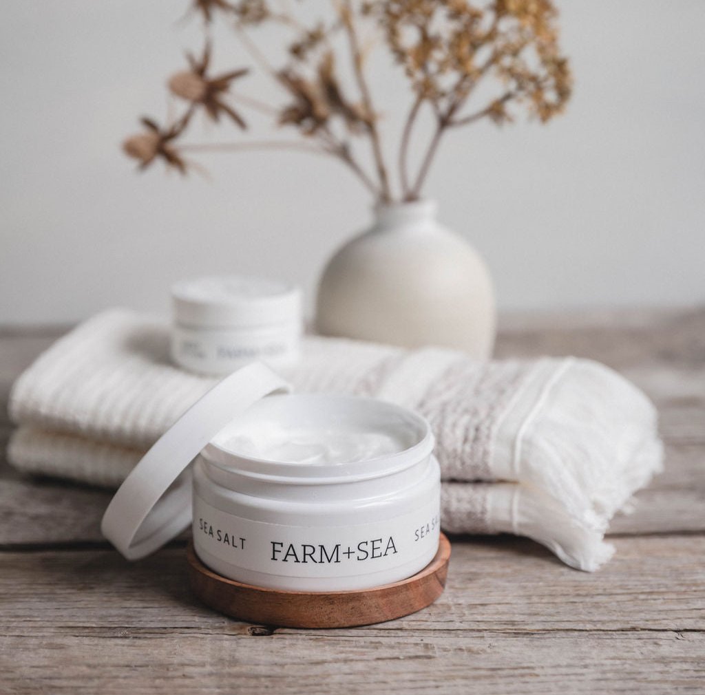 Farm + Sea Beach Girl 8oz body lotion in a clean, coastal scent. Lightweight, hydrating formula with clean ingredients. Available at Be Charmed.
