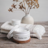 Farm + Sea Beach Girl 8oz body lotion in a clean, coastal scent. Lightweight, hydrating formula with clean ingredients. Available at Be Charmed.