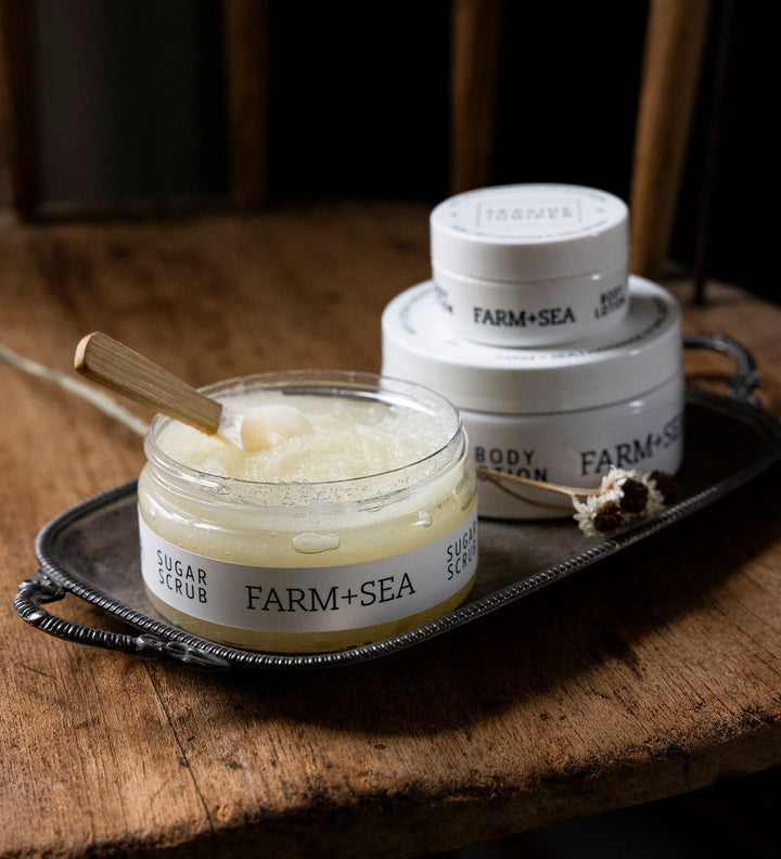 Farm + Sea Beach Girl sugar scrub with natural exfoliants and nourishing ingredients for smooth skin. Available at Be Charmed.