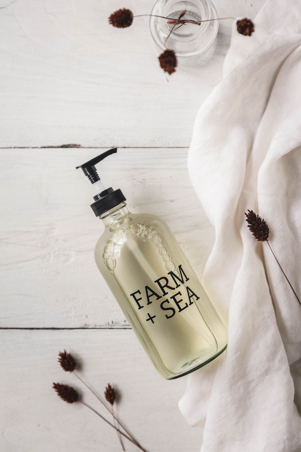 Farm + Sea Small Fir Tree Liquid Hand Soap – gentle cleanser with a fresh, woodsy scent for daily use. Available at Be Charmed.