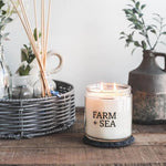Farm + Sea Salt Air 14 oz scented candle with fresh coastal ocean scent and natural ingredients. Clean-burning and long-lasting. Available at Be Charmed.