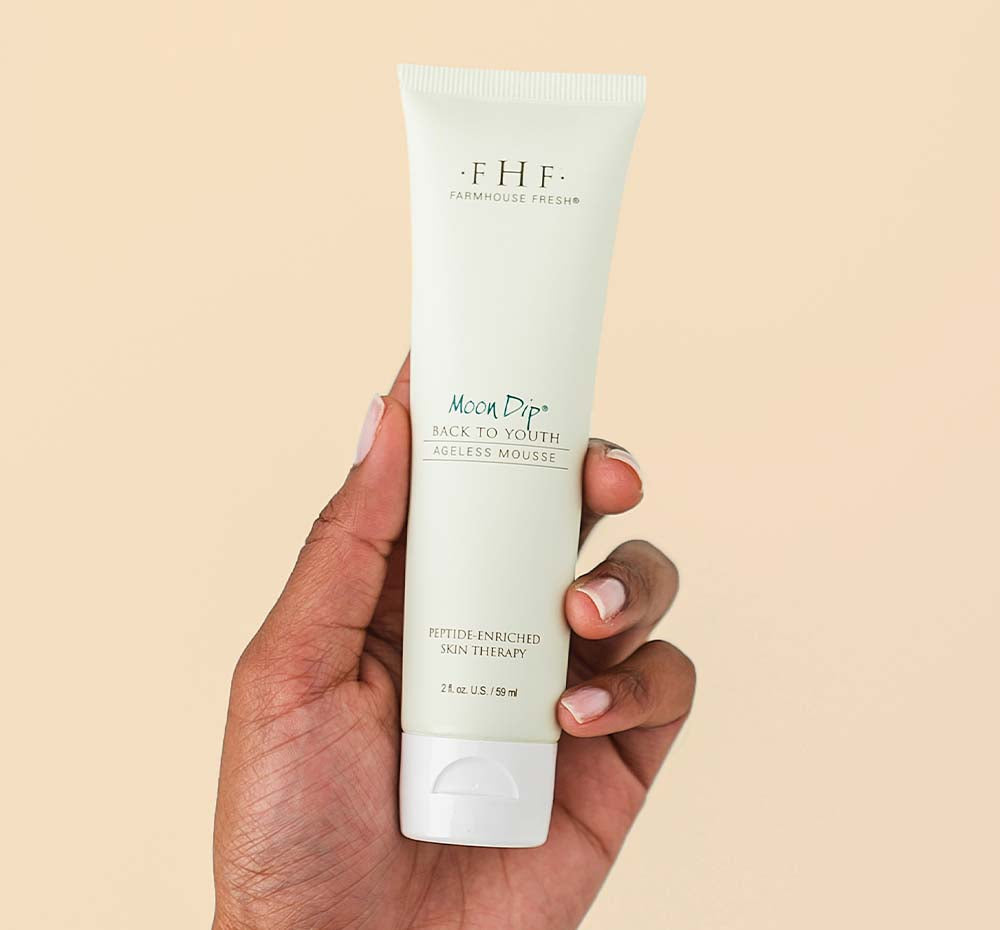 Farmhouse Fresh Moon Dip Back to Youth body mousse available at Be Charmed.