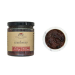 Jar of Finch + Fennel cranberry chutney with a close-up of the spreadable texture. Available at Be Charmed