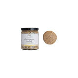 Jar of champagne honey with a cork on a white background. Available at Be Charmed