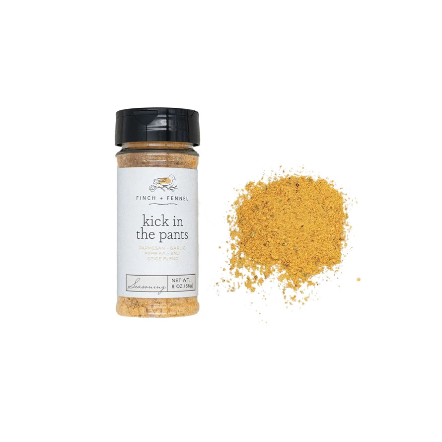 Spice jar labeled 'kick in the pants on a white background. Available at Be Charmed