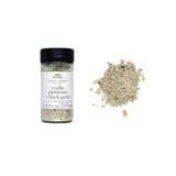 Truffle parmesan black garlic seasoning jar with a white background. Available at Be Charmed