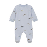 Light blue baby onesie with car pattern on a white background. Available at Be Charmed.