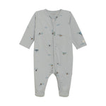 Gray baby onesie with plane prints on a white background. Available at Be Charmed. 