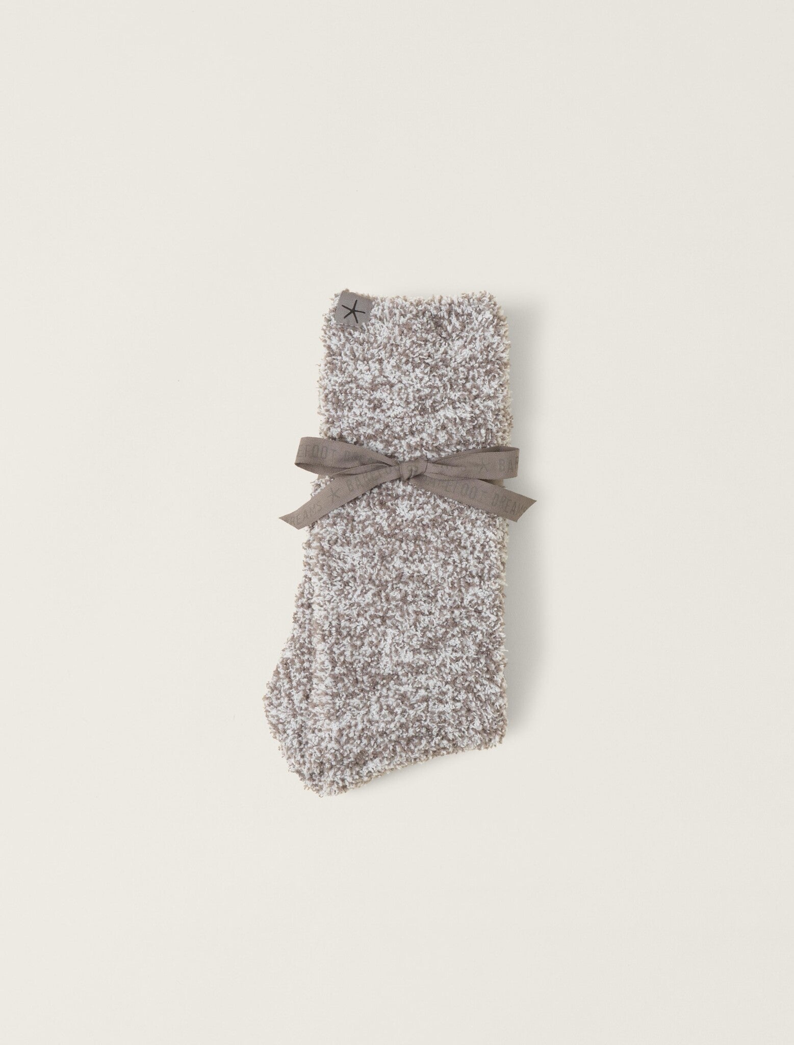 Folded Barefoot Dreams CozyChic heathered crew socks in charcoal and white, plush-knit, water-resistant vinyl, available at Be Charmed.