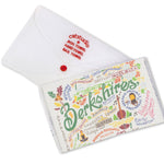 Folded Be Charmed Berkshires dish towel featuring Catstudio’s hand‑drawn map with iconic Berkshires landmarks on 100% hand‑loomed cotton, available at Be Charmed.