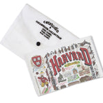 Folded with package Catstudio Harvard University dish towel featuring hand-illustrated campus icons and collegiate details, decorative and functional kitchen linen celebrating school pride, Available at Be Charmed