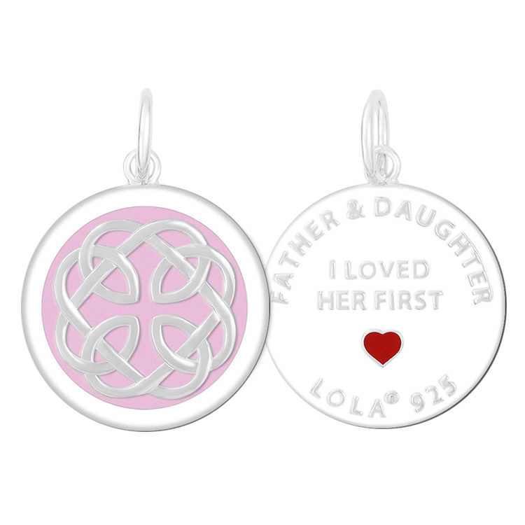 Front & Back of A Lola silver pendant with an enamel inlay design, featuring a geometric pattern and the text 'I loved her first'. Available at Be Charmed