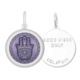 Front & Back of A Lola sterling silver pendant featuring the Hamsa Hand, with enamel inlay. Available at Be Charmed