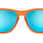 Orange sunglasses with blue reflective lenses on a white background. Available at Be Charmed
