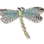 Dragonfly-shaped charm with silver and green details on a white background. Available at Be Charmed. 