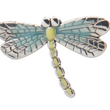 Dragonfly-shaped charm with silver and green details on a white background. Available at Be Charmed. 