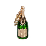 Ganz Pop The Bubbly Charm. Festive champagne-themed charm symbolizing joy and celebration. Perfect gift for special occasions. Available at Be Charmed.